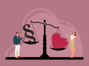 Ilustracja przedstawia wagę, przy której stoją małżonkowie.